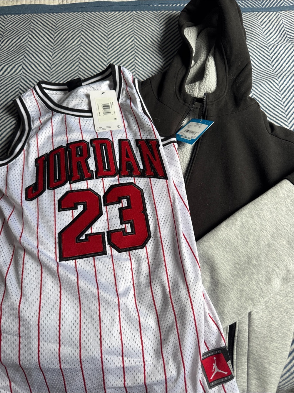 Boys large Jordan jersey and hoodie both new!